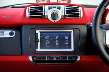 Sat nav system built in to a car dashboard.