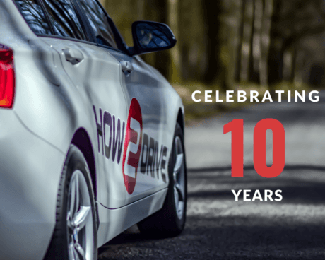 Picture showing a How-2-Drive car and the words, celebrating 10 years
