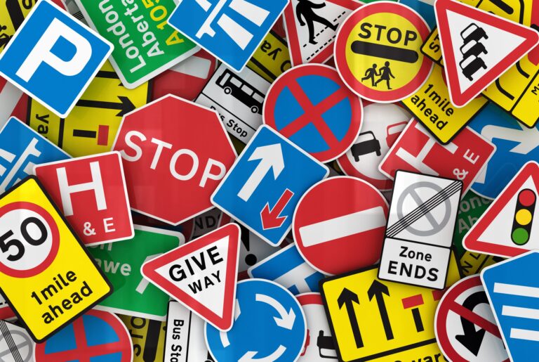 Picture showing lots of road signs