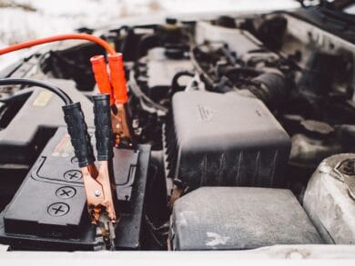 Picture showing a car battery with attached jump leads