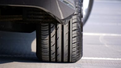 A brand new car tyre, with plenty of tread depth - perfect for driving in winter!