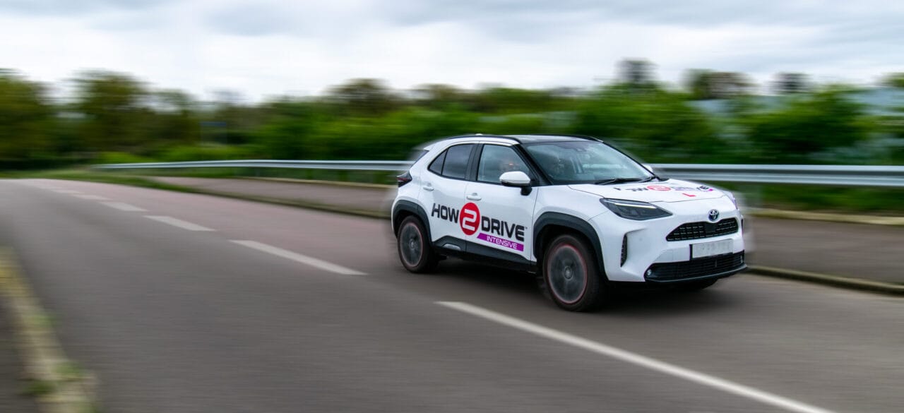 An intensive driving tuition vehicle making good progress along a stretch of dual carriageway in Norwich.